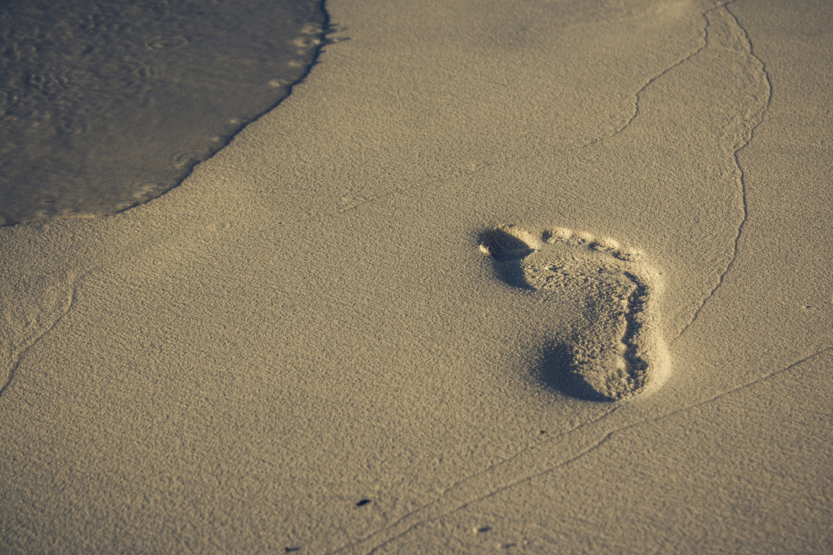 Fußabdruck im Sand