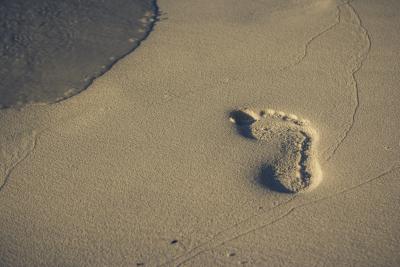 Fußabdruck im Sand